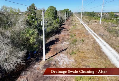 Aerial view of a drainage swale cleared of overgrown brush along a power line easement